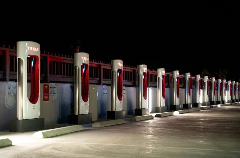 Electric car charging at home in the evening