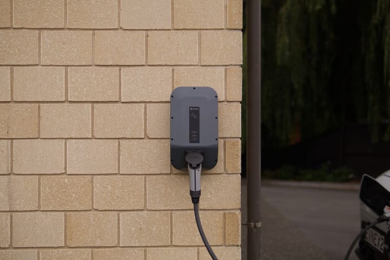 A compact wall-mounted home EV charger unit